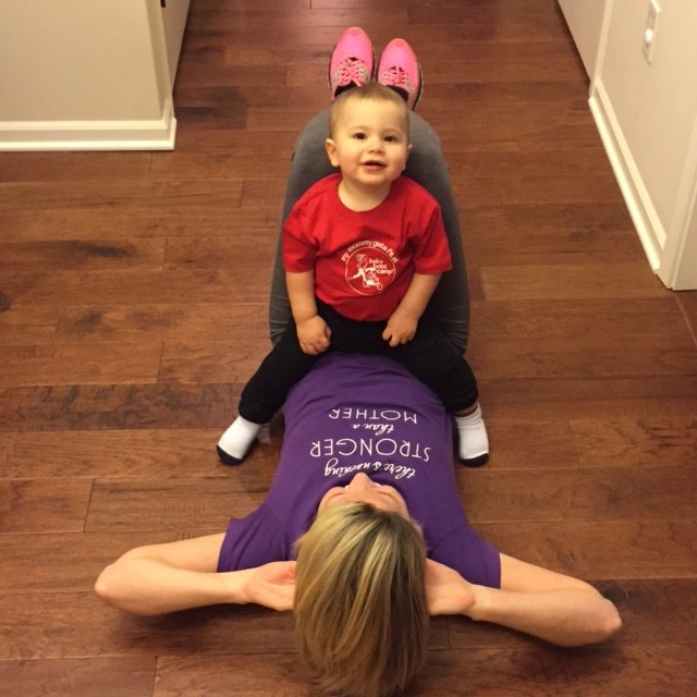 Kara Babcock does an exercise called “kiss the baby ab crunches.” (Submitted photo)