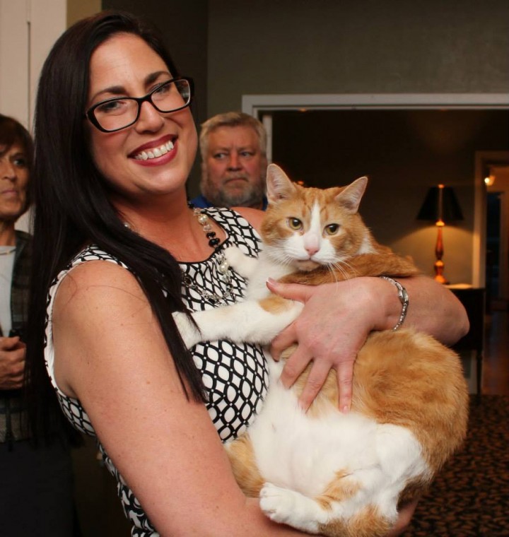 Humane Society for Hamilton County Executive Director Rebecca Stevens holds a shelter cat at last year’s fundraiser. (Submitted photo)