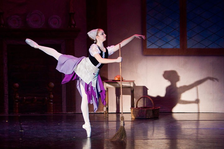 Megan Hustel dances with a broom in “Cinderella.” (Submitted photo)