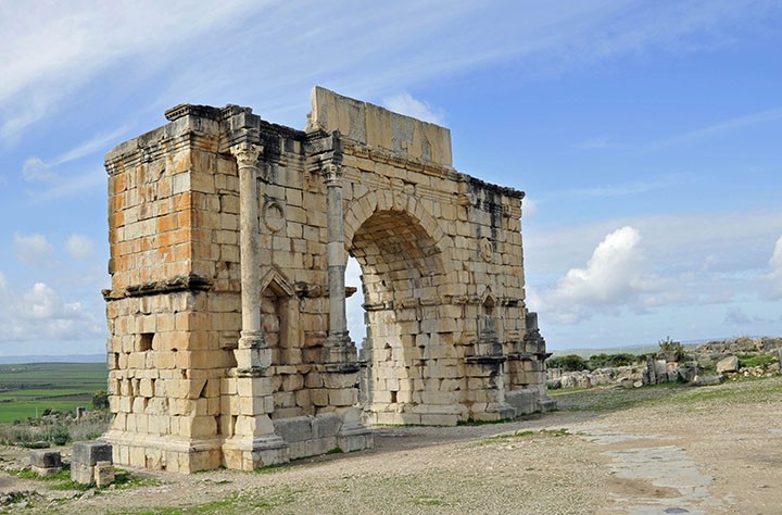 Restored Arch of Emperor Caracalla in Volubilis, Morocco (Photo by Don Knebel)